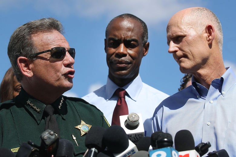 Florida Governor Rick Scott (R), Broward County Superintendent of Schools, Robert W. Runcie (C) and Broward County Sheriff, Scott Israel (L) on February 15, 2018 in Parkland, Florida.